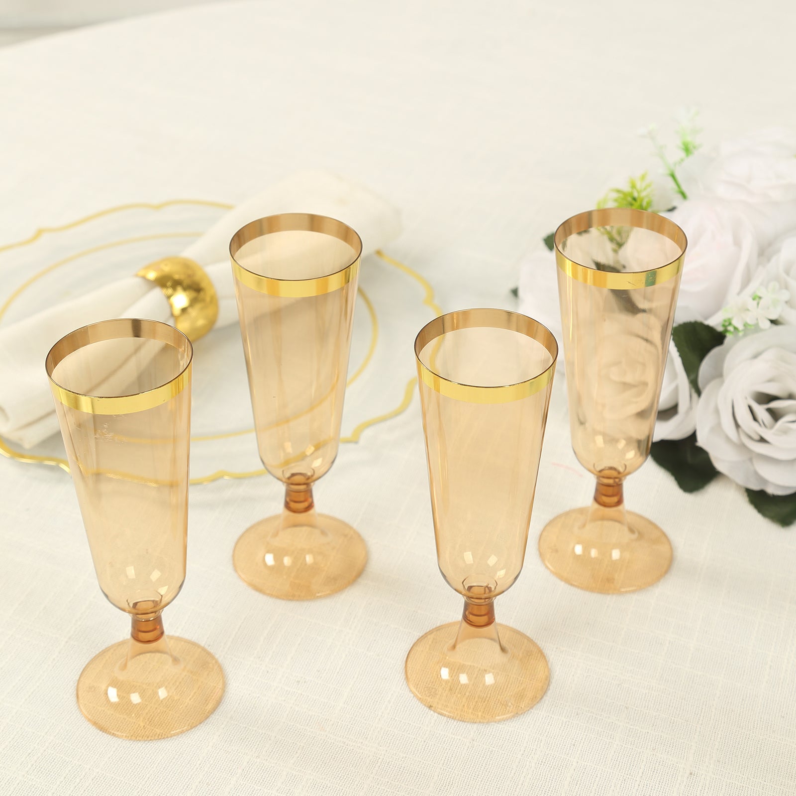 Stylish Disposable 5oz Plastic Champagne Flutes in Transparent Amber Gold with Gold Rim - 12-Pack for Parties