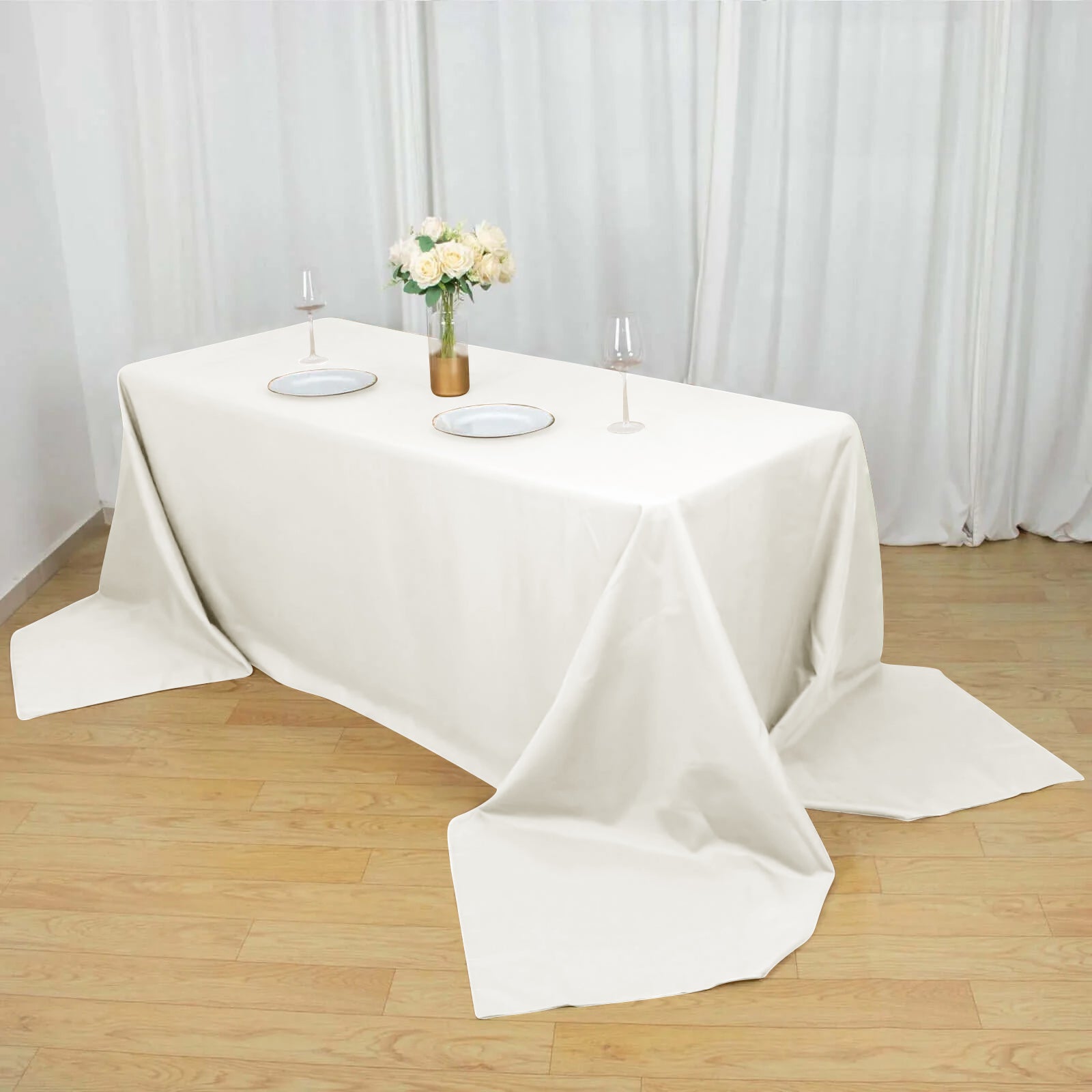 Ivory Polyester Seamless Wrinkle-Resistant 90x156 Rectangle Tablecloth - Ideal for Events