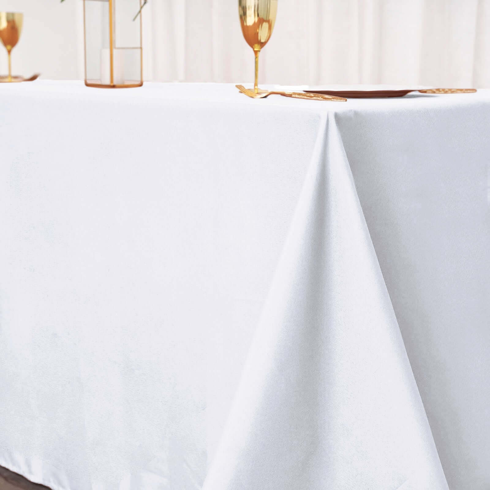 Get This White 90x132 Polyester Rectangle Tablecloth for Luxurious Celebrations